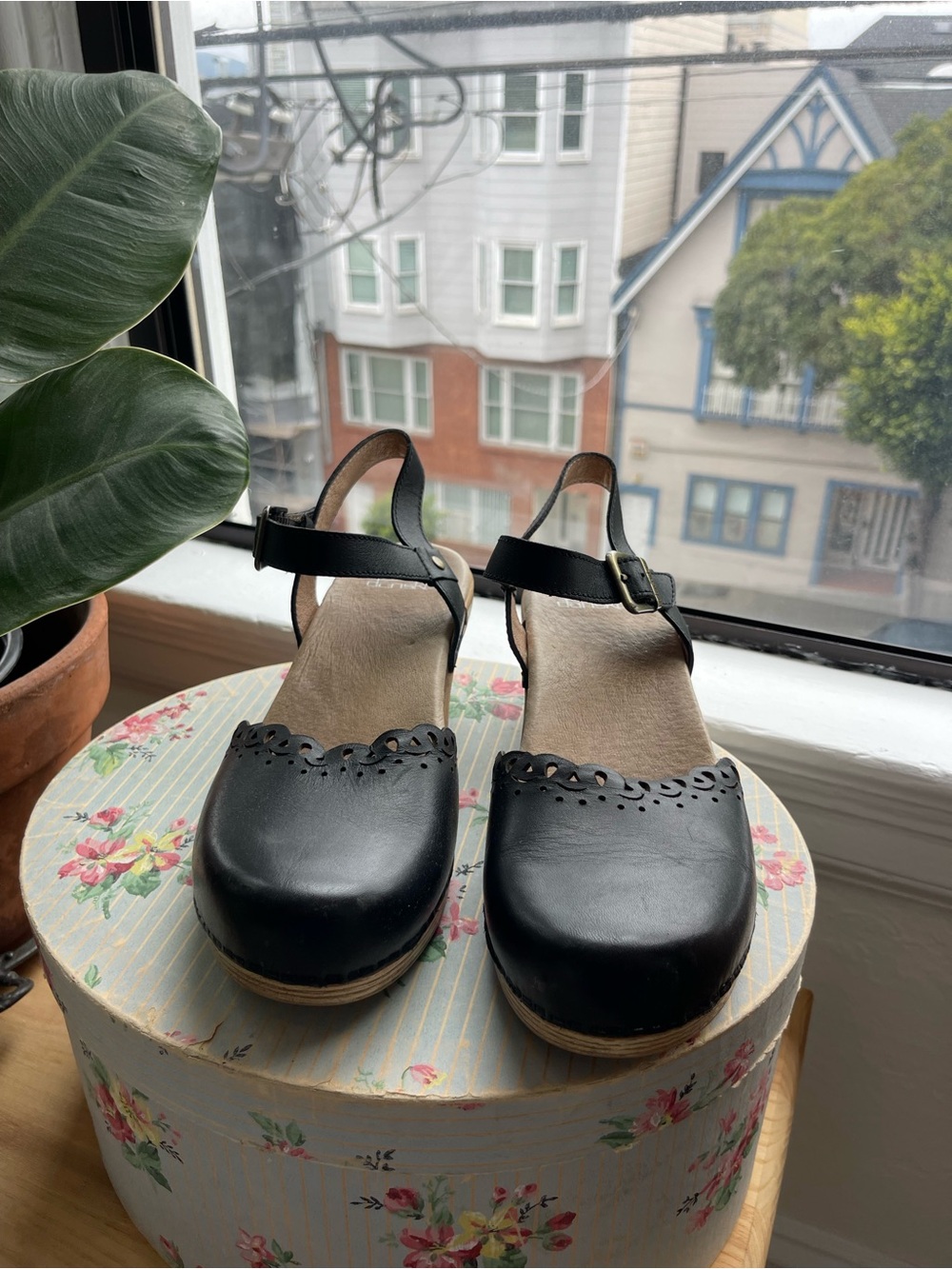 Black Leather Dansko Clogs with Decorative Cutouts - Picture 2 of 3